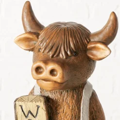 Deko Figur Schottisches Hochlandrind Buffi Willkommen, Hochlandrind mit Latzhose und Schild, Boltze